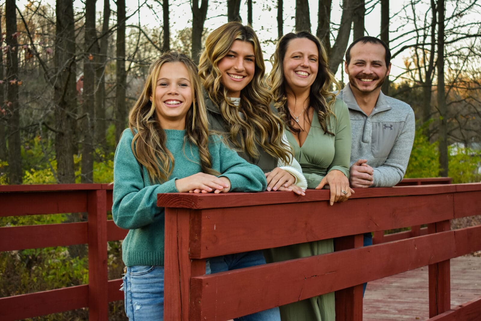 Warner Family on a red bridge